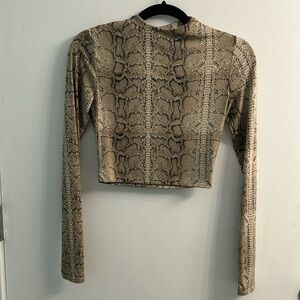 Naked wardrobe size small snake print going out top